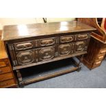 AN ANTIQUE OAK JACOBEAN STYLE TALL DRESSER, with two short drawers and two deeper drawers below,