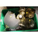 A TRAY OF VINTAGE OIL LAMP PARTS, LIGHT SHADES ETC