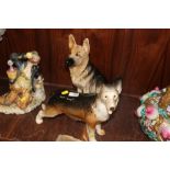 A BESWICK FIRESIDE MODEL OF A GERMAN SHEPHERD / ALSATION MODEL 2401 TOGETHER WITH ANOTHER DOG FIGURE