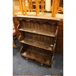 A VINTAGE WALL RACK WITH TWO DRAWERS