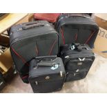 FOUR LUGGAGE BAGS