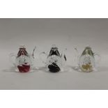 A BOXED SET OF THREE DECORATIVE GLASS COFFEE POTS / PAPERWEIGHTS