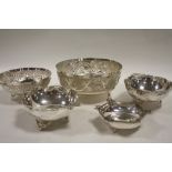 A COLLECTION OF WHITE METAL BOWLS