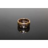 A GENTS HALLMARKED 9 CARAT ROSE GOLD WEDDING BAND size - T weight - 11.3g approx
