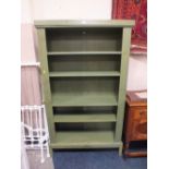 A MODERN GREEN PAINTED OPEN BOOKCASE H-185 W-105 CM