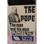 A VINTAGE CARDBOARD EVENING MAIL ADVERTISING SIGN RELATING TO THE POPE 76CM X 50.5CM