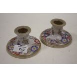 A PAIR OF BURSLEY WARE CHARLOTTE RHEAD SQUAT CANDLESTICKS