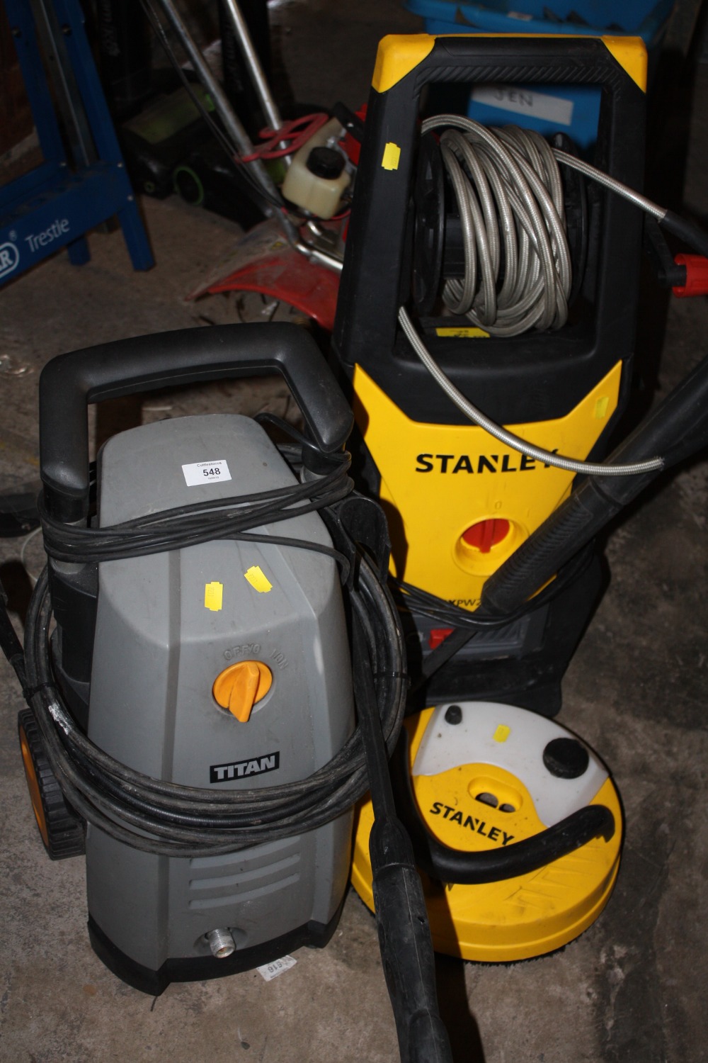 A STANLEY PRESSURE WASHER TOGETHER WITH A TITAN EXAMPLE