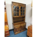 A CARVED OAK GLAZED BOOKCASE H-194 CM W-92 CM