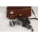 A PAILLARD BOLEX ZOOM REFLEX AUTOMATIC K2 CAMERA WITH CARRY CASE AND ACCESSORIES