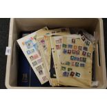 A BOX OF VINTAGE AND MODERN WORLD STAMPS, BOTH LOOSE AND IN ALBUMS