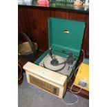 A RETRO VINTAGE GREEN DANSETTE PORTABLE RECORD PLAYER