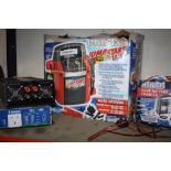 A BOXED CLARKE JUMP START TOGETHER WITH A 6AMP BATTERY CHARGER, POWER INVERTER ETC