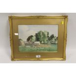 A FRAMED AND GLAZED WATERCOLOUR LAID ON BOARD OF A FARMYARD SCENE INDISTINCTLY SIGNED LOWER RIGHT