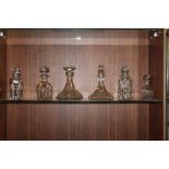 SIX ASSORTED CRYSTAL/CUT GLASS DECANTER to include a large ships decanter