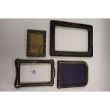 A COLLECTION OF HALLMARKED SILVER PICTURE FRAMES A/F, various styles and periods to include