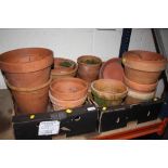 TWO TRAYS OF TERRACOTTA PLANT POTS