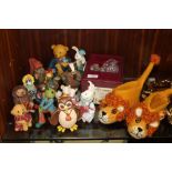 A COLLECTION OF RESIN ANIMAL FIGURES together with a pair of woollen sew heart felt lion shaped