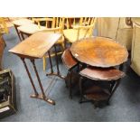 A REPRODUCTION MAHOGANY CIRCULAR NEST OF TABLES AND AN OCCASIONAL TABLE