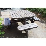 A 4-WAY SEATED GARDEN BENCH