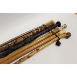 A COLLECTION IF SIX VINTAGE ND MODERN WALKING STICKS AND CANES TO INCLUDE A DEER HOOF HANDLED