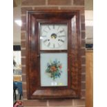 AN AMERICAN ANTIQUE RECTANGULAR WALL CLOCK WITH PAINTED FLORAL GLASS PANEL H 66 CM