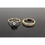 TWO HALLMARKED 9 CARAT GOLD GEMSET DRESS RINGS one being floral set with blue and clear stones,