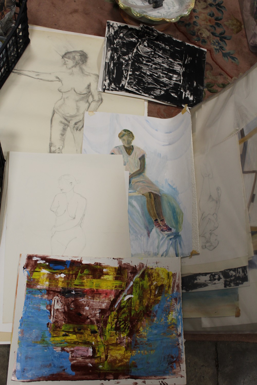 A FOLIO OF ASSORTED PENCIL SKETCHES AND WATERCOLOURS. to include female nude studies, seascape