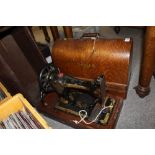 TWO VINTAGE CASED SINGER SEWING MACHINES