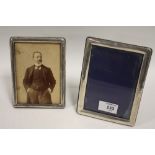 TWO HALLMARKED SILVER PICTURE FRAMES, to include a Chester example, tallest H 16.5 cm (2)