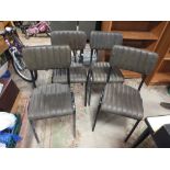 A SET OF FOUR MODERN LEATHER DINING CHAIRS