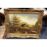 A GILT FRAMED OIL ON CANVAS DEPICTING A COUNTRY BARN unsigned 77cm x 61.5cm