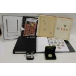 FOUR ALBUMS OF BRITISH AND WORLD STAMPS, TOGETHER WITH A PENNY BLACK CUFFLINK SET AND A PAPERWEIGHT