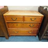 AN ORIENTAL STYLE HARDWOOD FOUR DRAWER CHEST - FADED H-78 CM W-92 CM