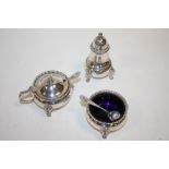 A HEAVY GAUGE HALLMARKED SILVER THREE PIECE CRUET SET WITH LION MASK DETAIL TOGETHER WITH SILVER