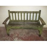 A WOODEN GARDEN BENCH