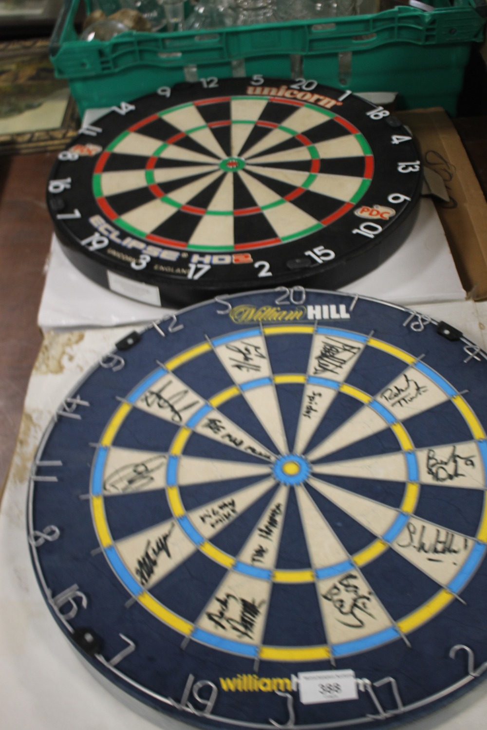 TWO AUTOGRAPHED MATCH DART BOARDS ONE FROM WOLVERHAMPTON BEARING VARIOUS SIGNATURES, TO INCLUDE,