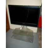 A TOSHIBA TV AND STAND