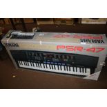 A YAMAHA TORTATONE PSR-47 ELECTRIC KEYBOARD