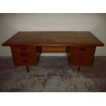 A LARGE TWIN PEDESTAL FIVE DRAWER TEAK DESK, TOP IS WATER MARKED, L 183 CM D 91 CM