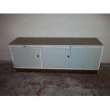 A WHITE PAINTED SCHOOL ART STORAGE CABINET WITH FORMICA TOP, L 195 CM