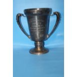 A HALLMARKED SILVER TWIN HANDLED TROPHY INSCRIBED 'OUBOROUGH CUP PRESENTED BY JAMES V. RANK FOR BEST
