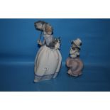 TWO NAO FIGURINES OF GIRLS WITH PUPPY (2)
