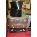 THREE VINTAGE SUITCASES AND A WIG BOX