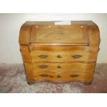 AN ANTIQUE SERPENTINE FRONTED BUREAU A/F