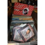 A QUANTITY OF LP RECORDS AND SINGLES TO INCLUDE SHAKIN STEVENS, ZZ TOP, STAR WARS ETC.