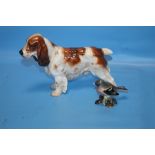 A ROYAL DOULTON SPANIEL DOG TOGETHER WITH A BESWICK CHAFFINCH (2)Condition Report:/b>The spaniel has