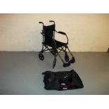 A BAGGED TRAVELITE WHEELCHAIR (FOLDABLE)