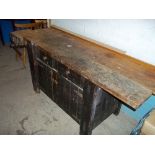 A CARPENTER'S BENCH WITH A VICE