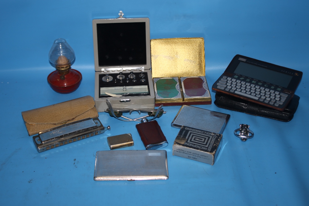 A QUANTITY OF COLLECTABLES TO INCLUDE PLAYING CARDS, LIGHTER, HIP FLASK, HARMONICA ETC.